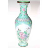 Chinese enamel vase decorated with two panels of lady and flowers, 31.5cm.