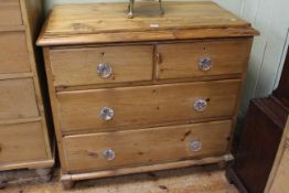 Pine chest of two short above two long drawers, 87cm by 96cm.