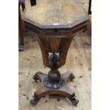 Victorian rosewood octagonal sewing table on inverted quadriform base, 71cm by 45cm.