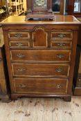 Good quality oak and satinwood banded chest having arched central cupboard door flanked by four