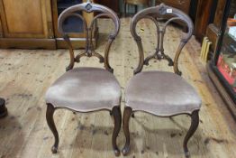 Set of four Victorian walnut parlour chairs on cabriole legs.