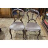 Set of four Victorian walnut parlour chairs on cabriole legs.