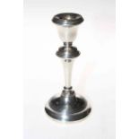 Damaged silver candlestick.