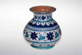 Islamic blue and white glazed pottery vase.