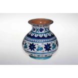 Islamic blue and white glazed pottery vase.