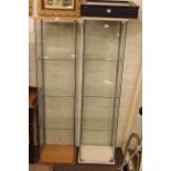 Two standing display cabinets and table top display cabinet (3).