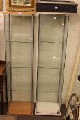 Two standing display cabinets and table top display cabinet (3).