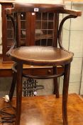 Bentwood elbow chair and two handled trunk.