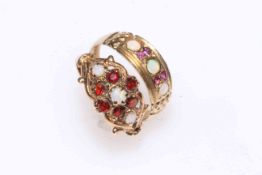 Two 9 carat gold, opal and garnet and opal and ruby rings.