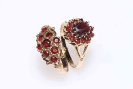 Two 9 carat gold and garnet rings.