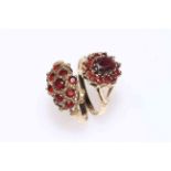 Two 9 carat gold and garnet rings.