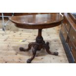 Victorian burr walnut fold top card table on turned and carved pedestal to four scrolled legs,