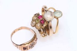 Collection of four gold rings including antique seed pearl and ruby.