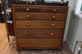 Victorian mahogany chest of two short above four long graduated drawers on turned legs,