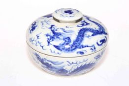 Chinese blue and white lidded box with dragon decoration.