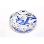 Chinese blue and white lidded box with dragon decoration.