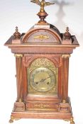 Oak brass and silvered dial mantel clock.