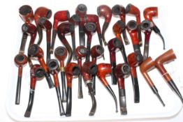 Collection of over thirty pipes.