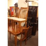 Extending dining table and four chairs, mahogany display cabinet,