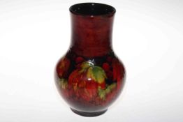 Large Moorcroft leaf and berry flambé vase, 25cm.