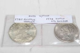 1780 Austrian Thaler and 1938 Dutch 2½ Guilder.