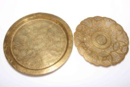 Islamic circular dish on three bun feet with silver and copper inlay and a rimmed circular Islamic