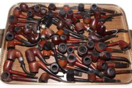 Collection of over fifty pipes.