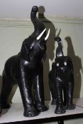 Pair of leather elephants (Liberty style), 74cm and 52cm.