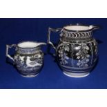 Two early 19th Century silver resist jugs, 16cm and 11cm.