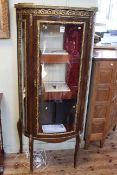 Continental ormolu mounted bow front vitrine, 149.5cm by 67cm.