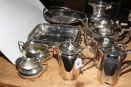 Collection of silver plated teapots, jug, basket, trays.