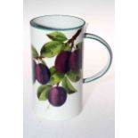 Wemyss ware tall tankard decorated with plums, 18.5cm high.