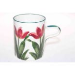 Wemyss ware mug decorated with tulips, 14cm high.