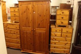 Pine double door wardrobe, five drawer chest, eight drawer chest,
