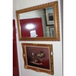 Gilt framed bevelled wall mirror and gilt framed still life (2).