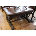 Victorian rectangular carved oak centre table having frieze drawer and raised on carved supports,