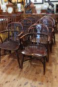 Good set of eight Windsor yew and elm pierced splat back elbow chairs with crinoline stretchers.