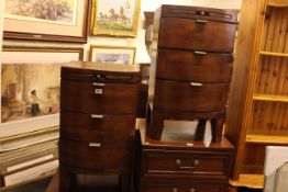 Pair three drawer bow front pedestal chests, 71cm by 40cm.