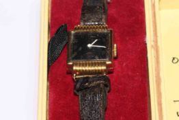 18 carat gold lady's wrist watch.