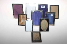 Collection of ten small silver rectangular easel photograph frames.