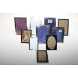 Collection of ten small silver rectangular easel photograph frames.