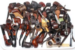 Collection of over fifty pipes.