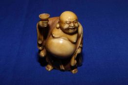 Japanese netsuke of Hotei, signed, 4.5cm.