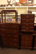 Stag Minstrel five piece bedroom suite comprising six drawer dressing table, seven drawer chest,