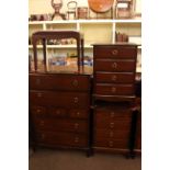 Stag Minstrel five piece bedroom suite comprising six drawer dressing table, seven drawer chest,