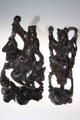 Two Chinese hardwood carved figures with silver inlay.