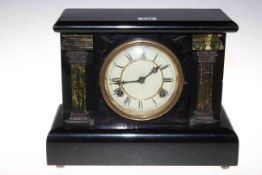 Ebonised slate effect mantel clock with enamel dial.