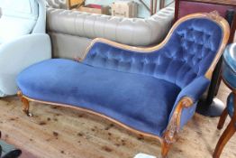 Victorian mahogany framed chaise longue with inverted serpentine front seat in blue buttoned