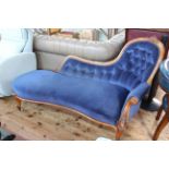 Victorian mahogany framed chaise longue with inverted serpentine front seat in blue buttoned