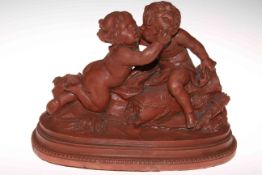 19th Century terracotta centre-piece of two putti, signed Cholin.